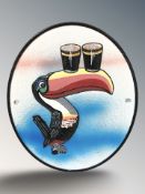 A cast iron Guinness toucan plaque, height 25 cm.
