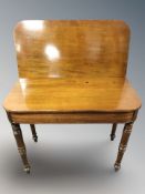 A Victorian mahogany turnover top tea table, width 91 cm.