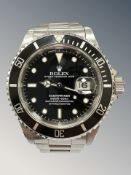 A gent's stainless steel Rolex Submariner automatic calendar wristwatch, ref.