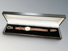 A Pulsar Lady's Watch, on brown leather strap, boxed.