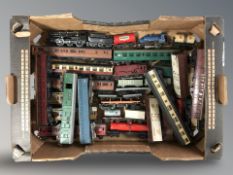 A quantity of die cast locomotives, carriages and other rolling stock.