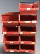 Nine plastic stackable storage boxes,