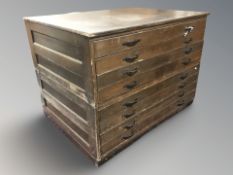 A Victorian oak eight drawer plan chest,