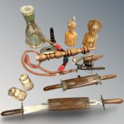 Two Eastern carving sets in wooden sheaths, two busts, a hookah pipe,
