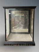 An early 20th century ebonised and carved J S Fry & Sons Limited glazed shop counter display