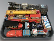 A group of tin plate cars, fire engine, locomotive, etc.