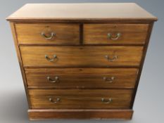 An Edwardian mahogany chest of five drawers,