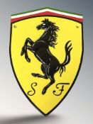 A cast iron Ferrari plaque, height 30 cm.