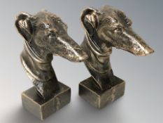 A pair of bronzed metal greyhound busts, height 22 cm.