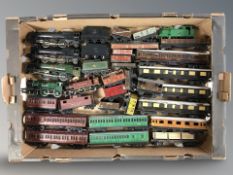 A quantity of die cast locomotives, carriages and other rolling stock.