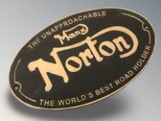 A cast iron Norton plaque, width 33 cm.
