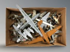 A quantity of die cast miniature scale aircraft.
