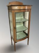 A late Victorian mahogany bow front display cabinet, 58 cm W x 40 cm D x 130 cm H.