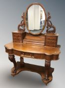 A Victorian mahogany dressing table, 123 cm x 54 cm x 158 cm.