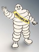 A cast iron Michelin man plaque, height 35 cm.