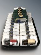 A group of boxed Lledo die cast vehicles.