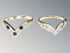 Two 9ct gold wishbone rings set with diamonds and sapphires,