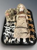 A bisque headed doll,