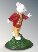 A cast iron Rupert the bear door stop, height 30 cm.