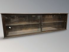 A Victorian mahogany glazed sliding door wall cabinet,