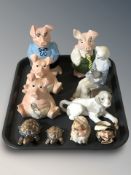 Four Wade Natwest pigs, two tortoises, Nao figures of a clown and a puppy,