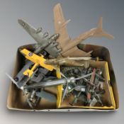 A group of die cast scale model aircraft.