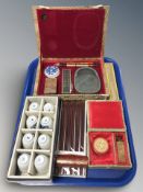 A group of boxed oriental items including set of porcelain bowls, calligraphy set, hand fan,
