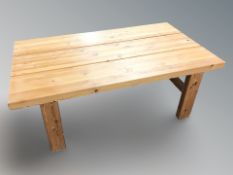 A Scandinavian pine rectangular coffee table, 140 cm x 78 cm x 50 cm.