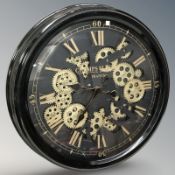 A quartz circular wall timepiece signed Champs Elysees, France, diameter 50 cm.