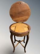 An early 20th century mahogany circular work table.