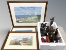 A group of golfing trophies and two related prints.