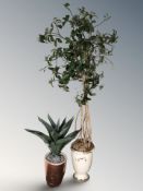 An artificial tree in pot, and a further plant, height 210 cm.