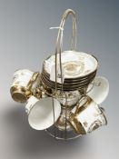 A Versace style china tea set on metal two tier stand including teapot,