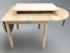 A Scandinavian beech extending table,