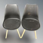 A set of six contemporary Scandinavian oak and moulded plastic chairs.