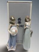 A Lladro figure 'Courtney' No. 5648, boxed, and a further similar Lladro figure of a lady.