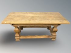 A continental oak farmhouse style dining table,