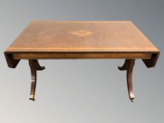 A continental inlaid mahogany drop leaf sofa table,