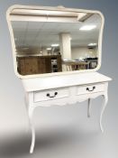 A painted two drawer side table on cabriole legs,