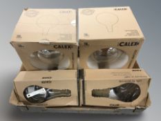 Four boxed oversized LED light bulbs