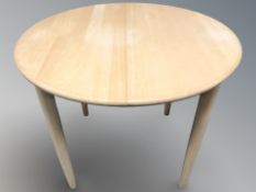 A Scandinavian circular beech table,