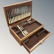 A canteen with some silver plated contents