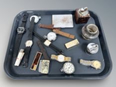 A group of lighters, wrist and pocket watches including Roamer and Sekonda,