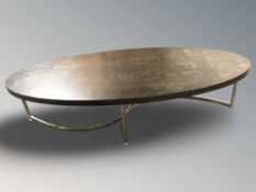 A Scandinavian chrome and stained wood oval coffee table, length 160 cm.
