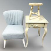 A painted single drawer lamp table, a small stool and a contemporary armchair.