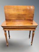 A continental mahogany turnover top tea table,