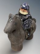 An Asa Gustavsson studio pottery figure of a horse and rider, height 18 cm.