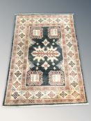 A Caucasian design rug,