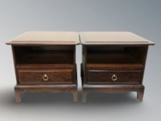 A pair of Stag Minstrel bedside cabinets.