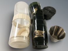 A set of six vintage plastic picnic cups in carry case,